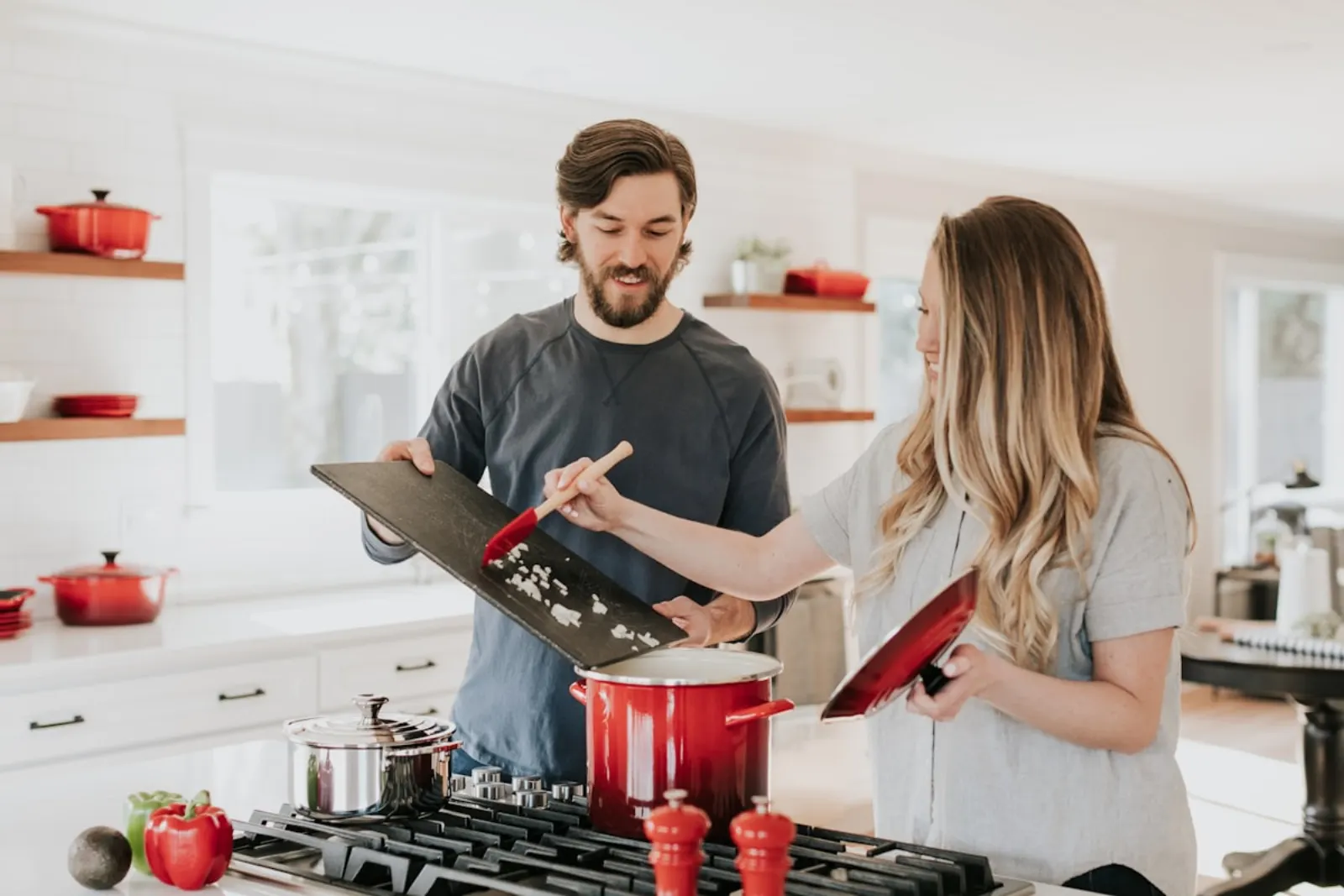 A person reviewing finances at their kitchen table